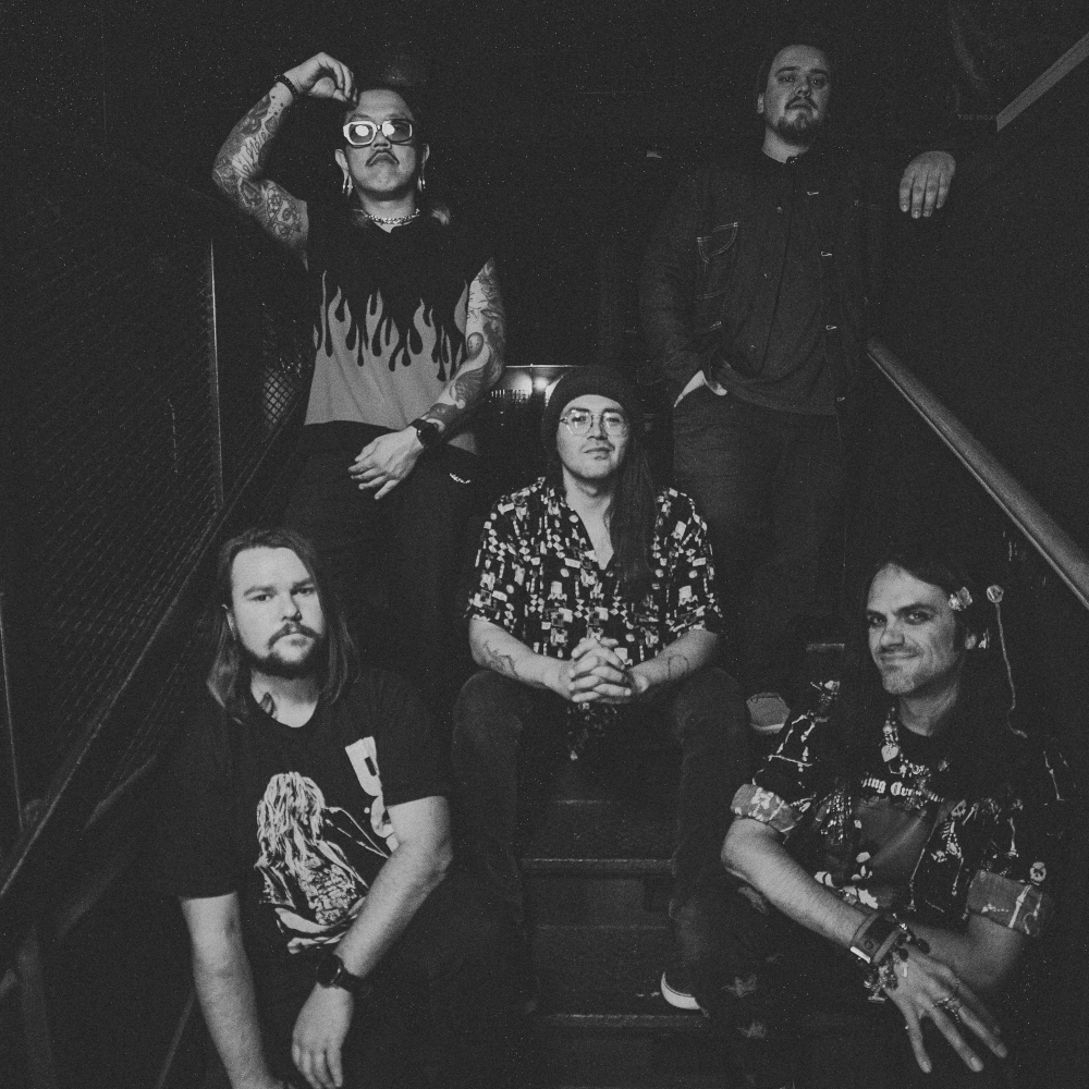 the band Perch sitting together at the Catalyst, Santa Cruz, CA